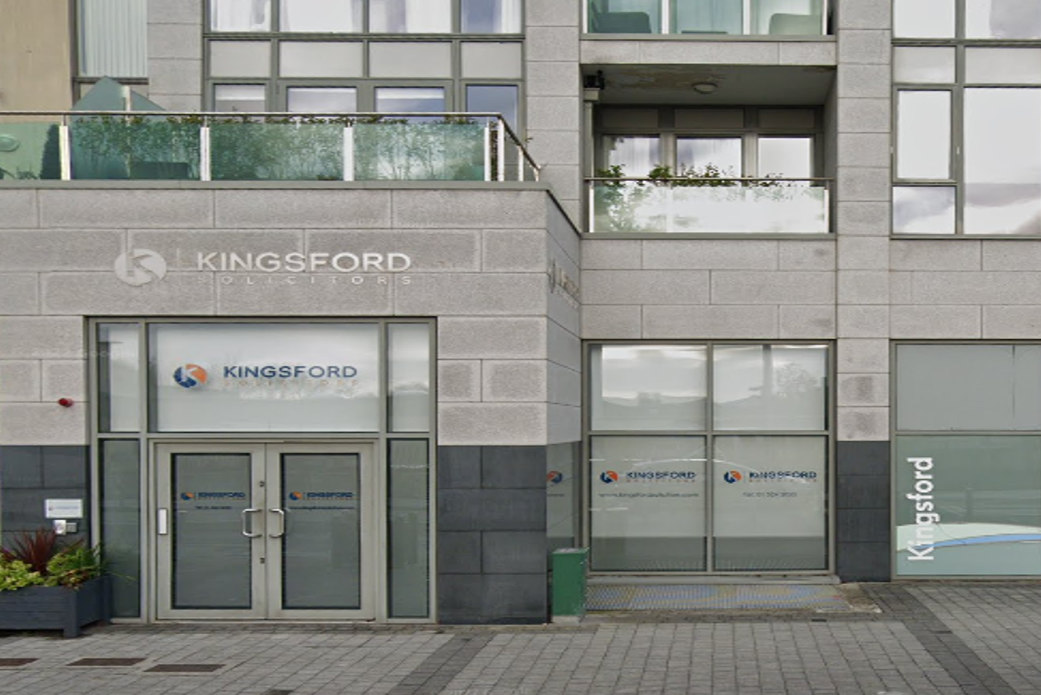Modern industrial building facade with large windows and minimalist concrete architecture
